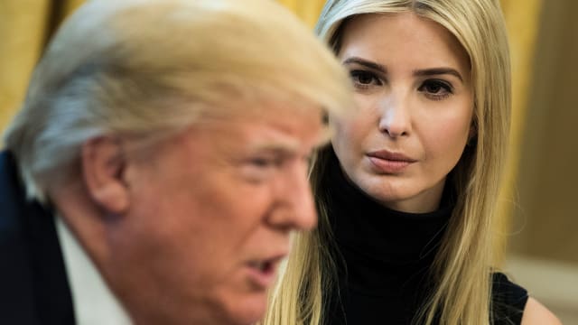 Ivanka Trump listens while her father US President Donald Trump speaks