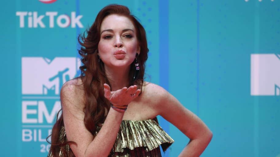 Lindsay Lohan blows a kiss to cameras at the 2018 MTV Europe Music Awards.
