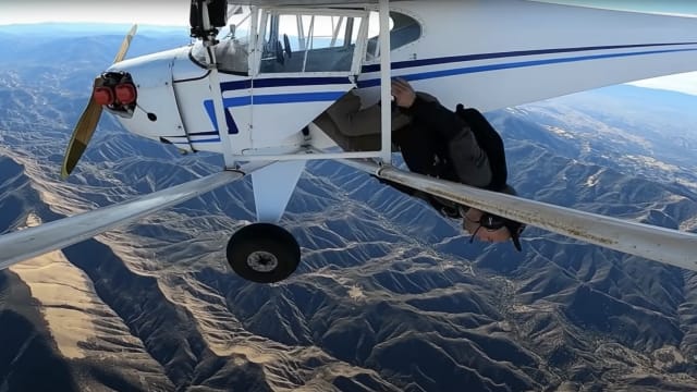 Trevor Jacob deliberately crashing his plane and parachuting to safety. 