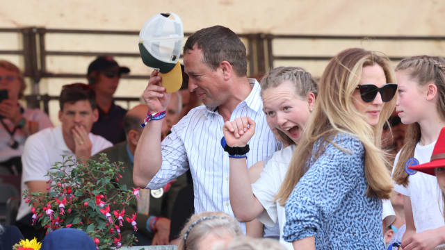 Peter Phillips and his daughter Savannah Phillips along with Peter's new girlfriend, nurse Harriet Sperling (in a blue dress) on May 12, 2024 in Badminton, Gloucestershire.