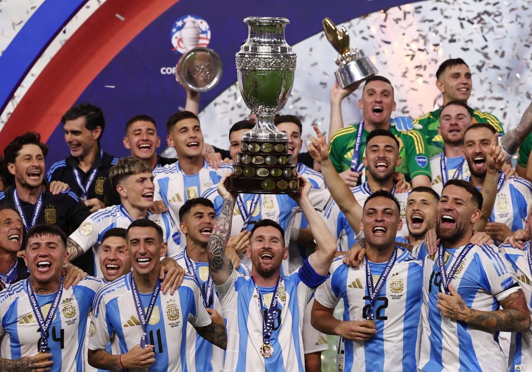 The Argentina team with the Copa America, held by Lionel Messi