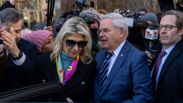 US Senator Bob Menendez (center right), Democrat of New Jersey, leaves with his wife Nadine Menendez the Manhattan Federal Court, in New York City following his arraignment on March 11, 2024.