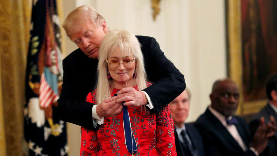 Former President Donald Trump awards the 2018 Presidential Medal of Freedom to Miriam Adelson