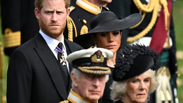 Britain's Meghan, Duchess of Sussex, reacts as she, Prince Harry, Duke of Sussex, Queen Camilla and King Charles attend the state funeral and burial of Britain's Queen Elizabeth, in London, Britain, September 19, 2022.