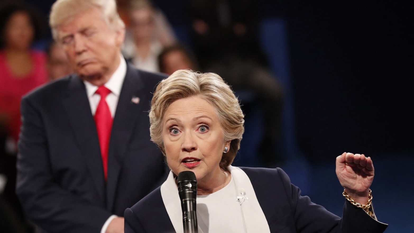 Democratic nominee Hillary Clinton (R) and Republican Presidential nominee Donald Trump participate in a town hall debate at Washington University in St. Louis, Missouri, on October 9, 2016.