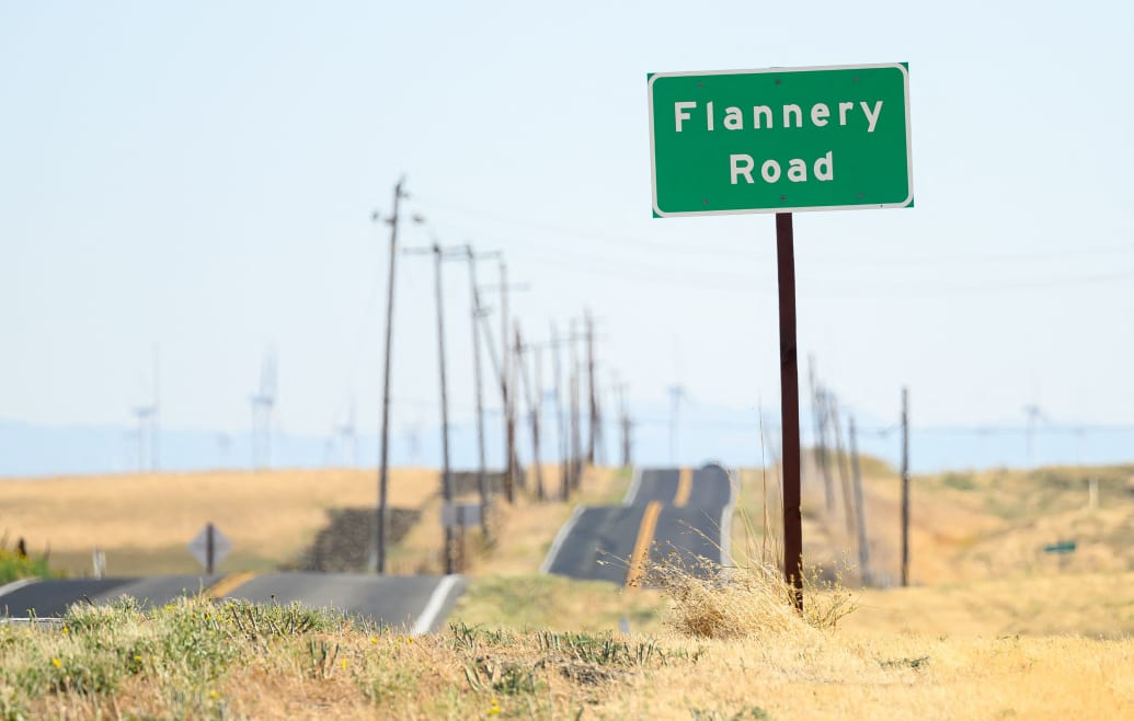 A road sign is posted near a parcel of land purchased by Flannery Associates near Rio Vista, California.
