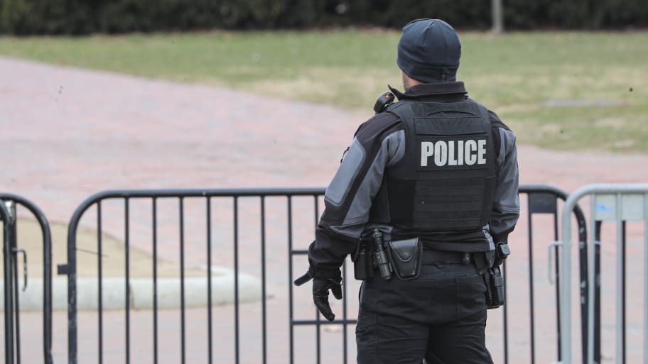 Secret Service agent on duty at Pennsylvania Avenue in front of the White House.