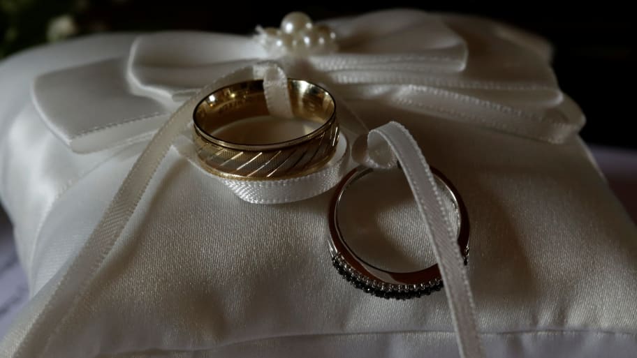 Wedding rings are seen before a wedding in a catholic church in Heredia, Costa Rica