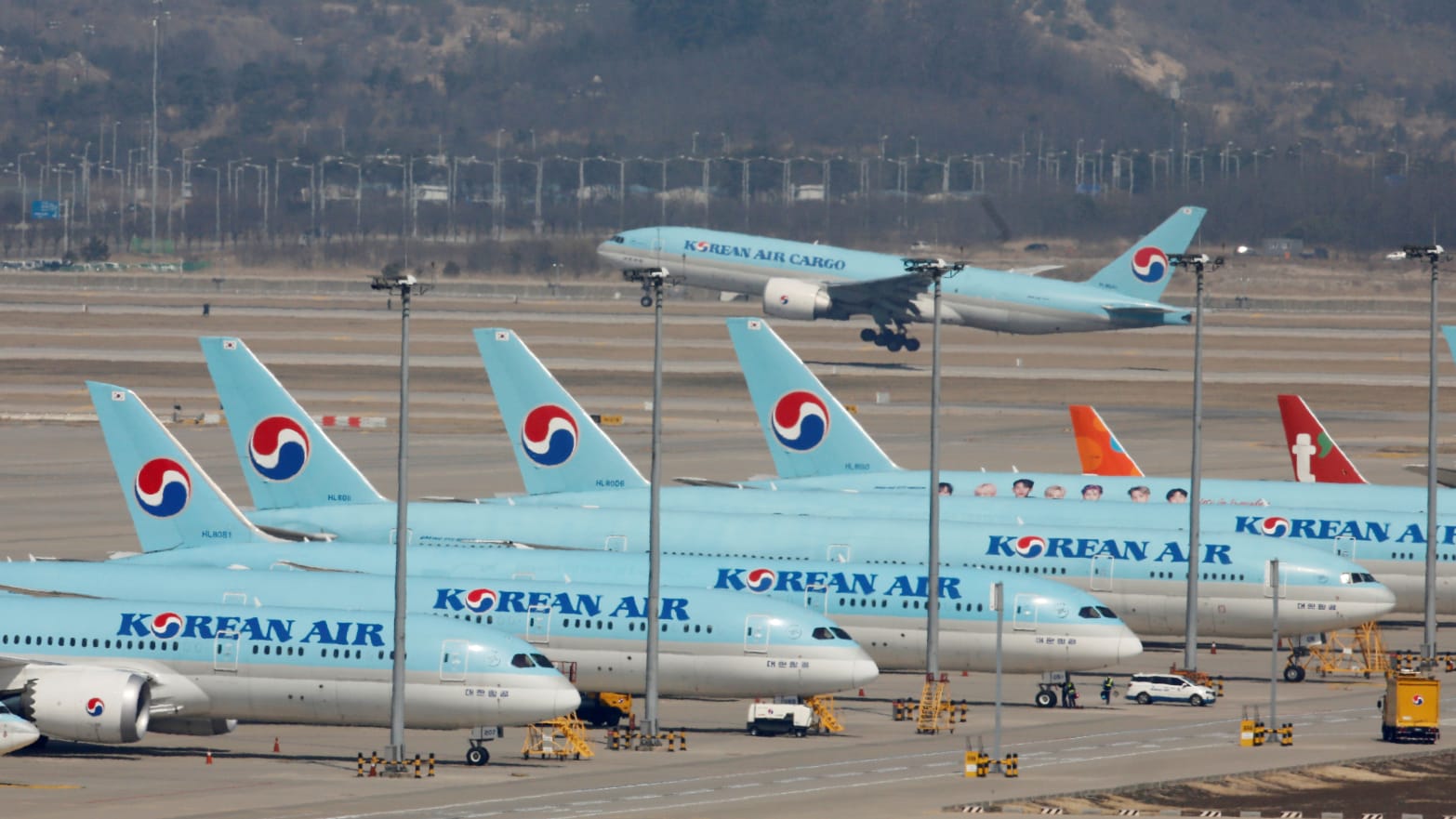 A Korean Air jet hit a Cathay Pacific aircraft at an airport in Japan. 