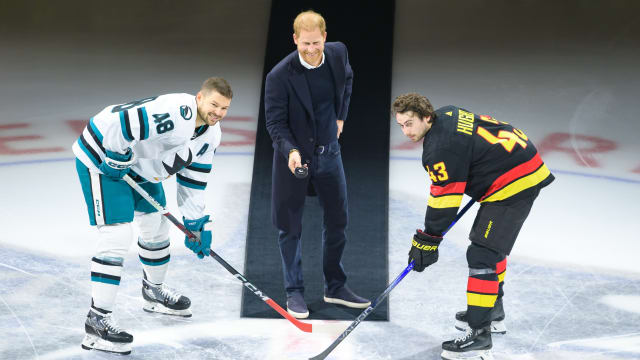 Prince Harry drops the puck.