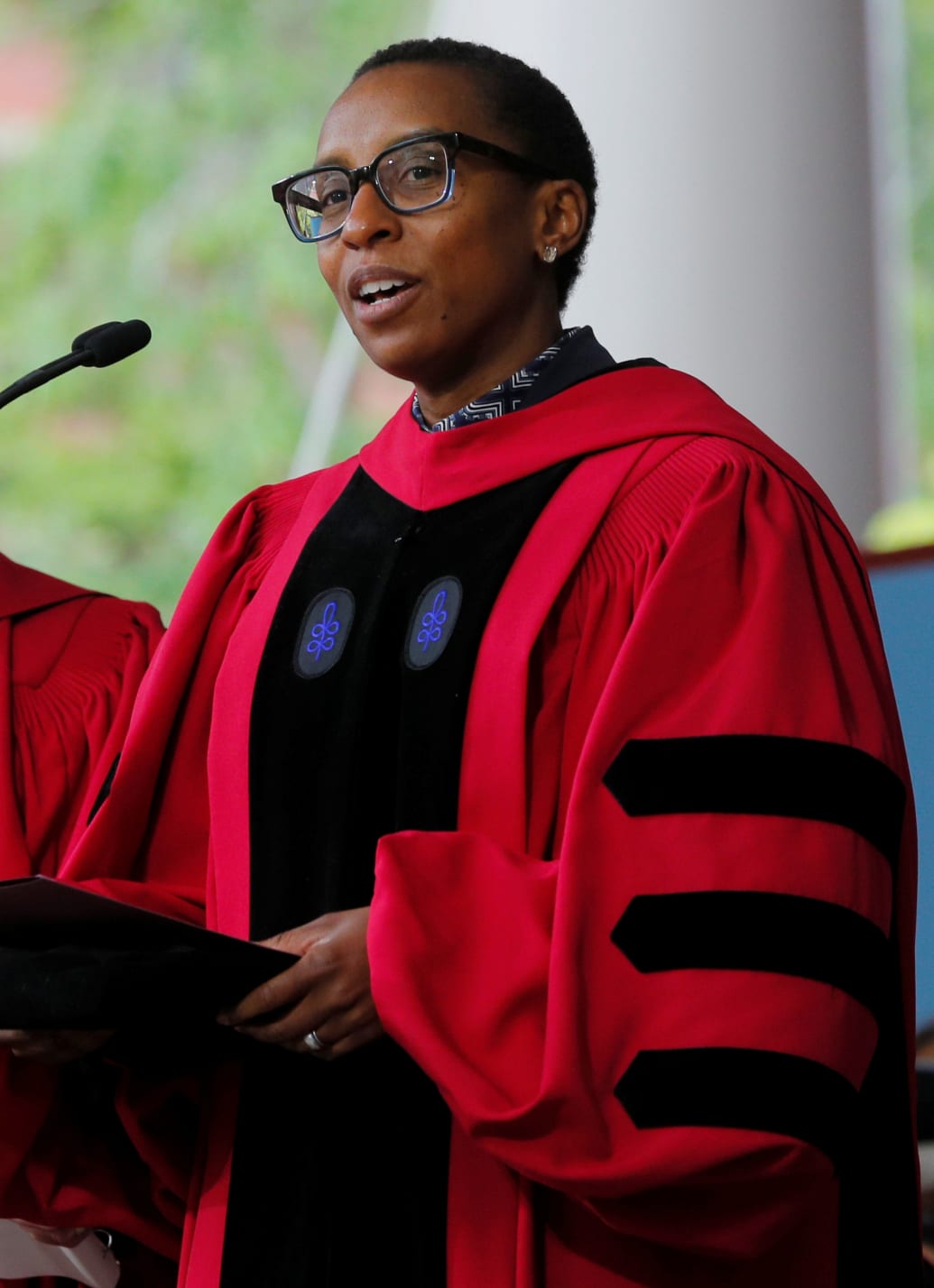 A photo of Harvard President Claudine Gay, then-dean of Harvard’s Faculty of Arts and Sciences, speaking at the university’s 2019 commencement.