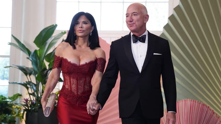Executive chairman of Amazon Jeff Bezos and actress Lauren Sanchez arrive for a State Dinner in honor of Japanese Prime Minister Fumio Kishida, at the Booksellers Room of the White House in Washington, DC, on April 10, 2024.
