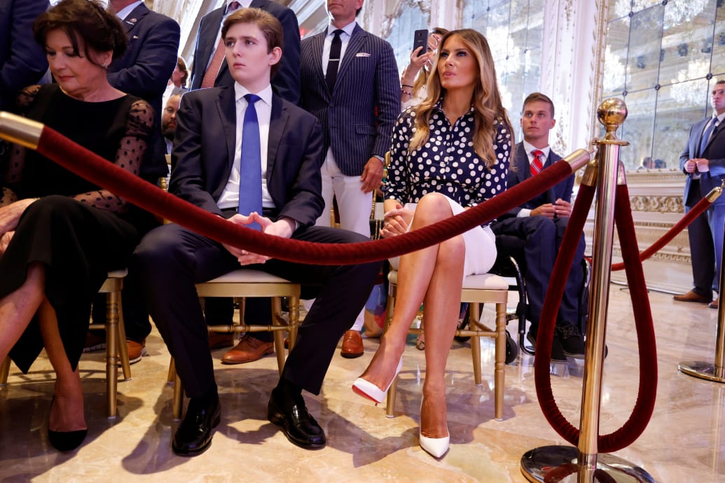 Melania Trump, sits in the front row with their son Barron Trump and her mother Amalija Knavs