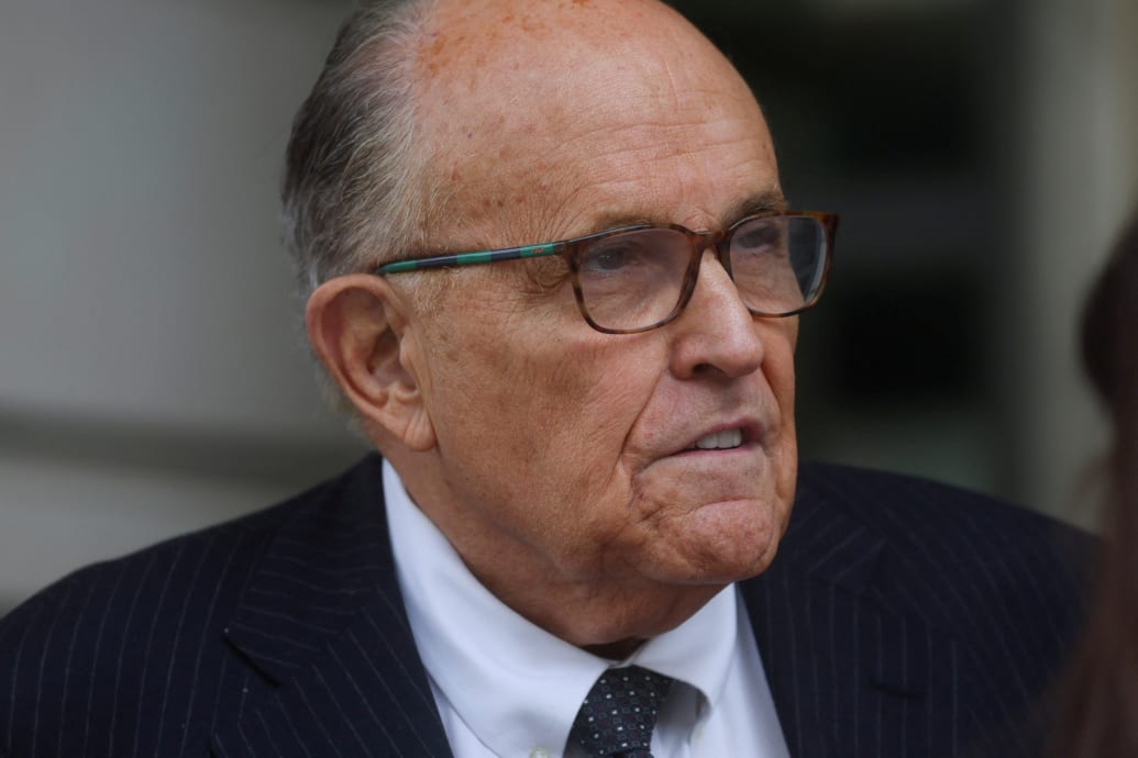 Former New York City Mayor Rudy Giuliani, an attorney for former U.S. President Donald Trump during challenges to the 2020 election results, exits U.S. District Court after attending a hearing in a defamation suit related to the 2020 election results