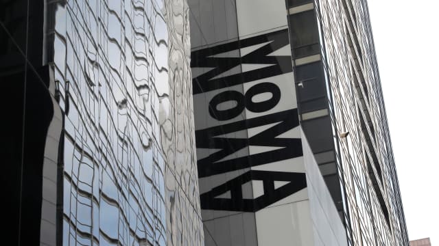 The Museum of Modern Art (MoMA) sideways sign outside the museum
