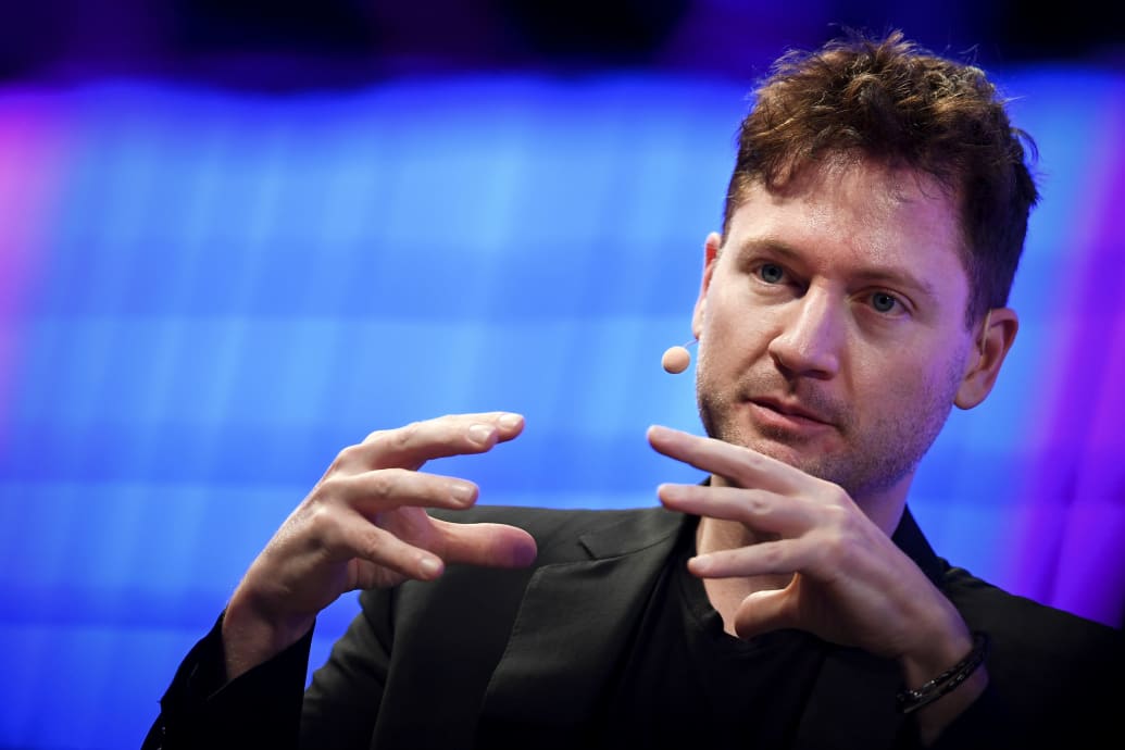 Bryan Johnson gestures during a interview at the main stage of the Web Summit in Lisbon on November 7, 2017.