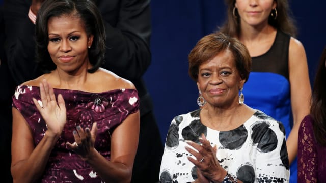  First lady Michelle Obama (L) applauds with her mother Marian Robinson (R) during the final day of the Democratic National Convention at Time Warner Cable Arena on September 6, 2012 in Charlotte, North Carolina.