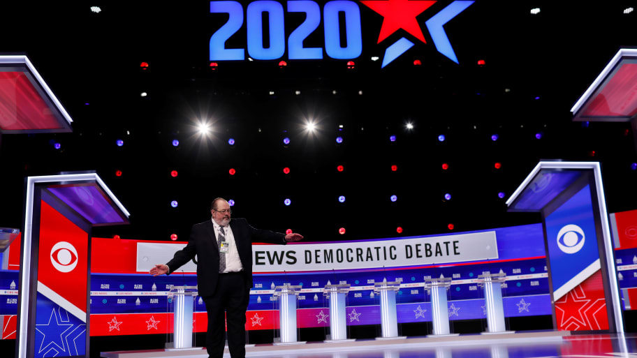 CBS News consultant David Bohrman stands on the stage for the tenth Democratic 2020 presidential debate at the Gaillard Center in Charleston, South Carolina, U.S. February 25, 2020.