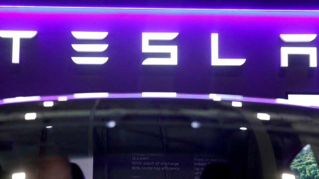 he logo of Tesla on display at the Everything Electric exhibition at the ExCeL London international exhibition and convention centre in London, Britain, March 28, 2024.  