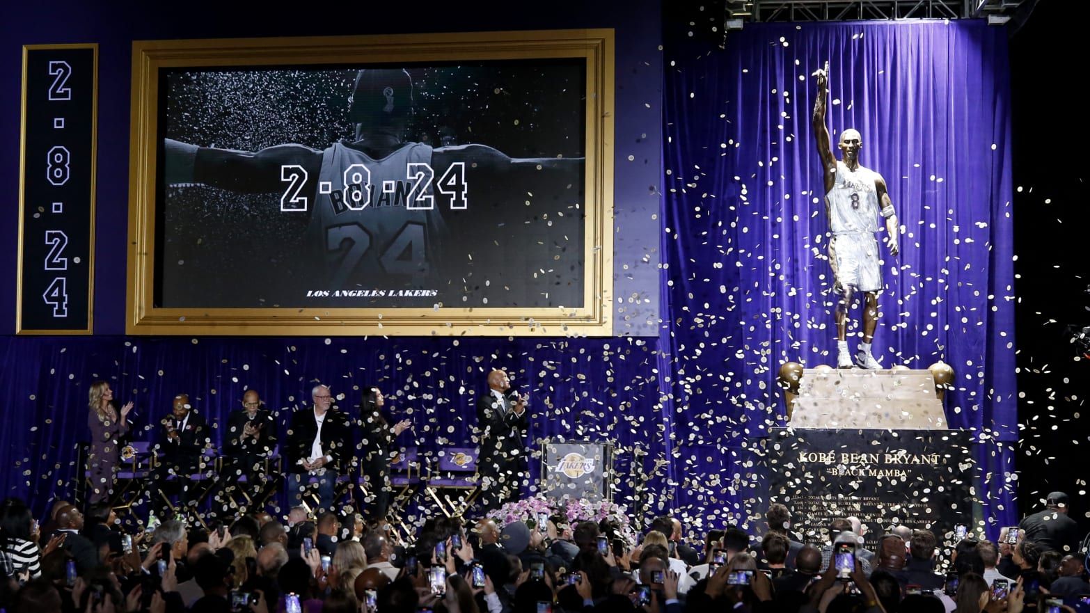 A statue for former Los Angeles Lakers guard Kobe Bryant is unveiled during a ceremony at Star Plaza outside of Crypto.com Arena.