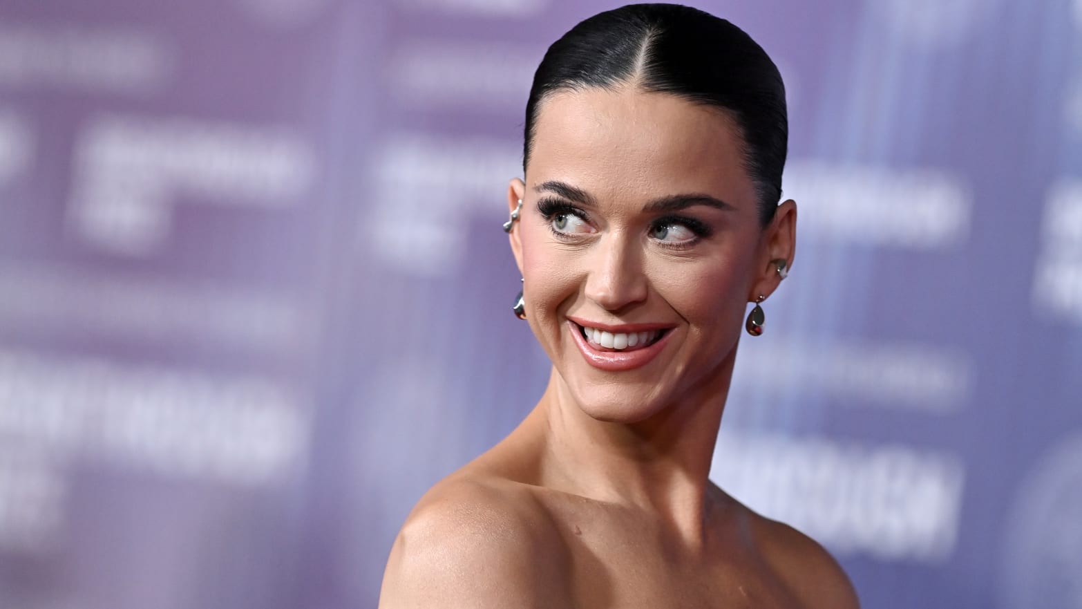 Katy Perry has explained how she rewards Orlando Bloom for doing the housework.