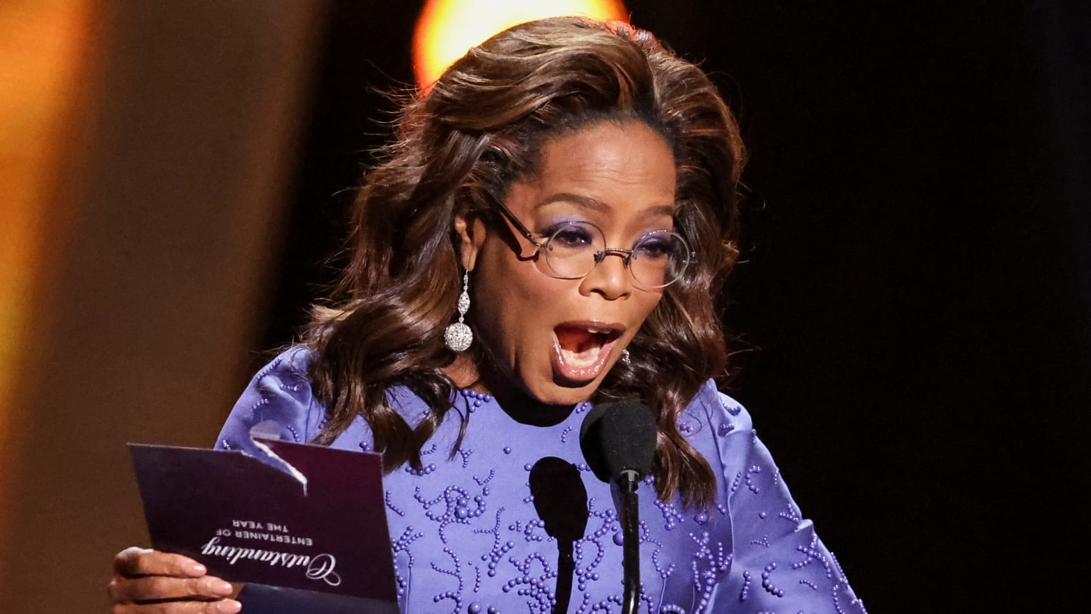 Two men were arrested near Oprah Winfrey’s ranch in Hawaii on suspicion of illegal hunting, authorities said.