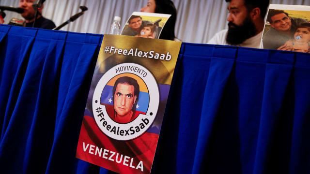 A “free Alex Saab” poster sits on a table during a press conference in Caracas, Venezuela, in 2022.