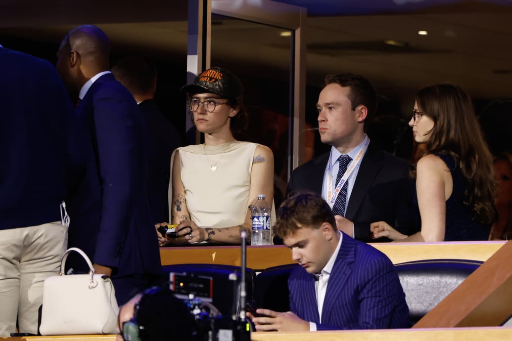 Ella Emhoff watching the convention in iconic camo hat