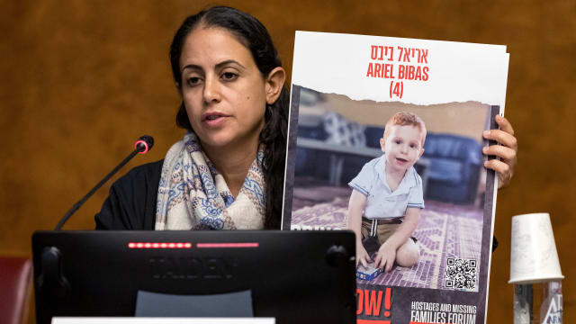 Ofri Bibas Levy, Sister of Yarden Bibas held hostage with his wife and two children Kfir and Ariel in the Gaza Strip by Palestinian militant group Hamas, speaks during a press conference.