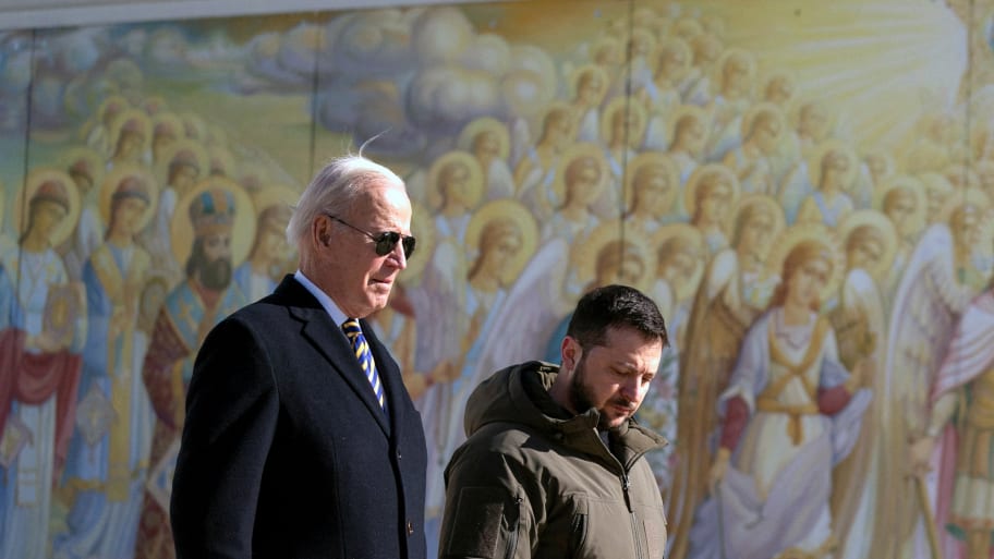 U.S. President Joe Biden walks with Ukrainian President Volodymyr Zelenskiy at St. Michael's Golden-Domed Cathedral during an unannounced visit, in Kyiv, Ukraine, Monday, Feb. 20, 2023.