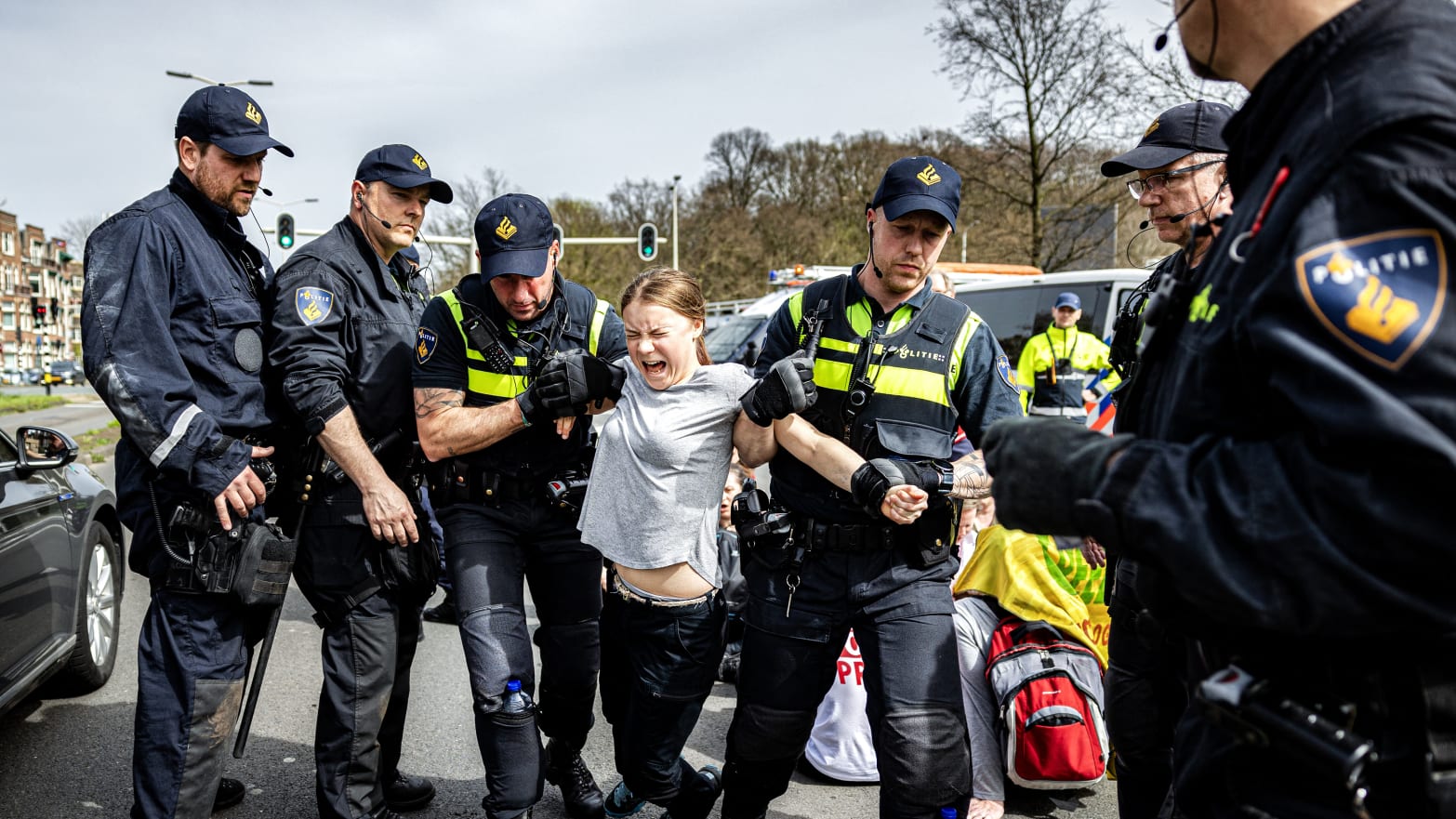 Swedish climate activist Greta Thunberg is arrested during a climate march against fossil subsidies near the highway A12 in the Hague, on April 6, 2024.