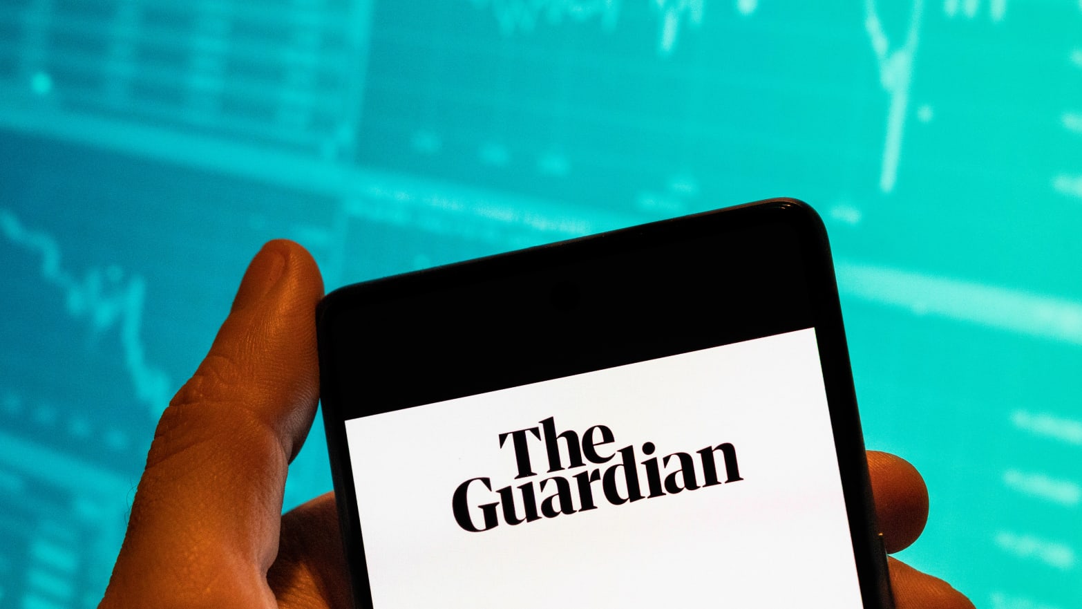 The Guardian logo on a smartphone.