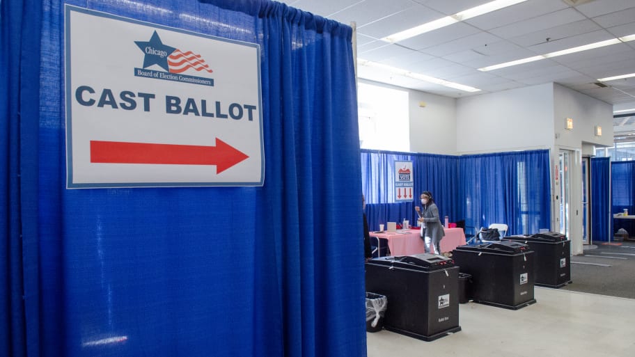 Voters cast their ballots at a polling station for the 2024 primary elections during early voting in Chicago. 