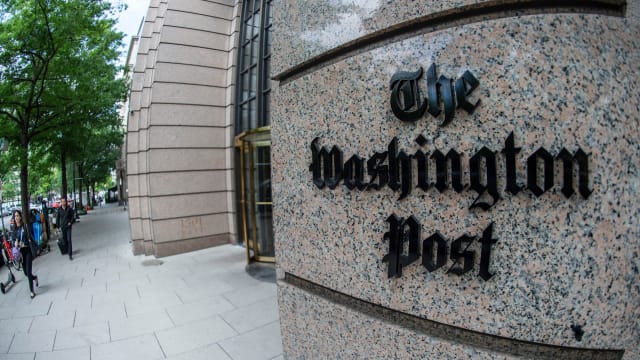 The Washington Post logo outside its building.