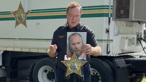 Polk County Sheriff holds a photo of Stephen Rodda