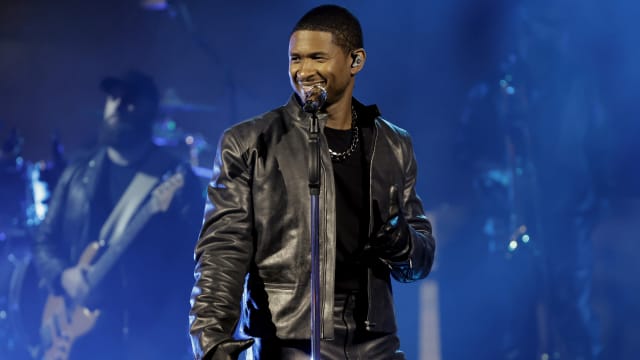 Usher singing.