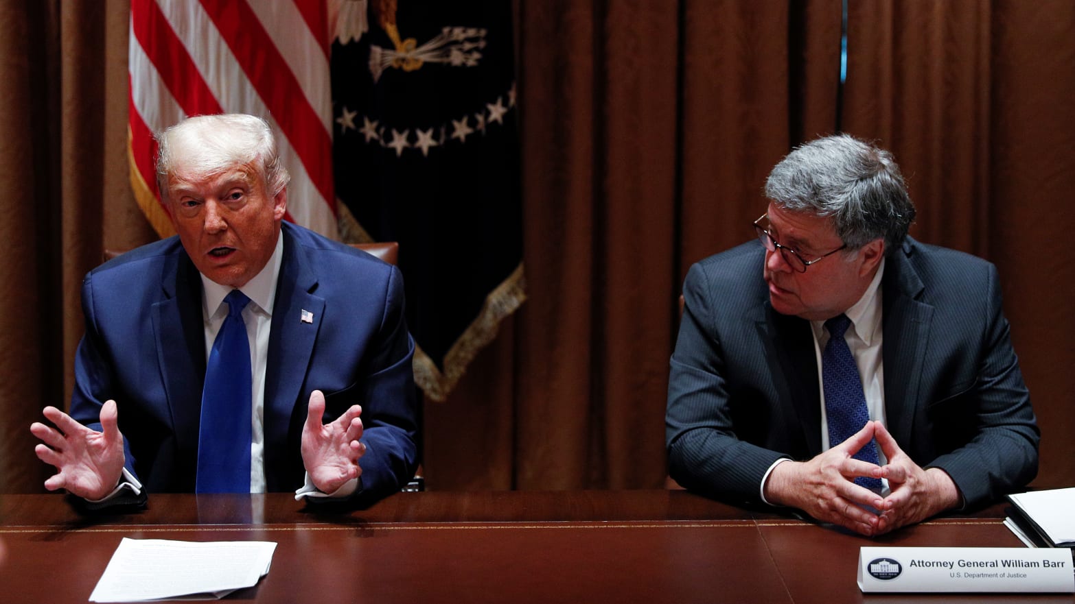 U.S. President Donald Trump speaks next to U.S. Attorney General Bill Barr during a discussion with state attorneys general on social media abuses in the Cabinet Room at the White House in Washington, D.C., Sept. 23, 2020.