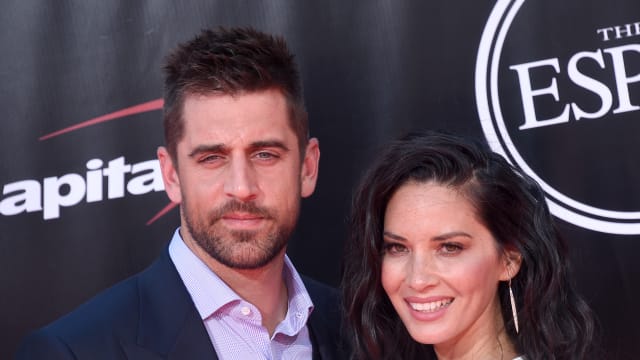 Aaron Rodgers says Olivia Munn was not to blame for family rift, says book.