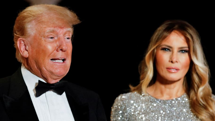 Ex-President Donald Trump, who announced a third run for the presidency in 2024, and his wife Melania Trump, attend the New Year's Eve party at his Mar-a-Lago resort in Palm Beach, Florida.