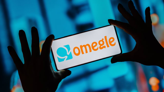 In this photo illustration, the Omegle logo is seen displayed on a smartphone screen.