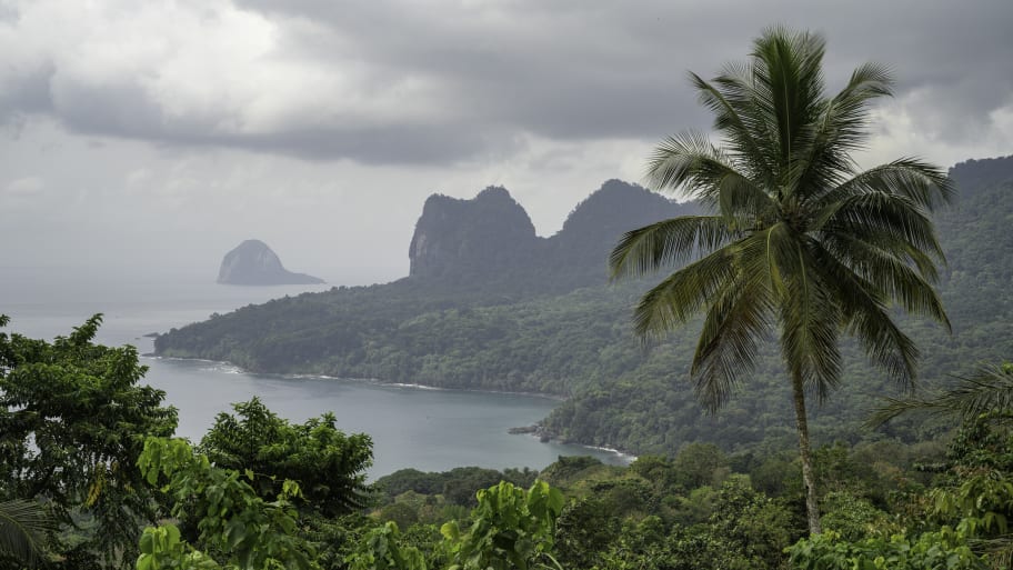 Panoramic view of the coastal mountains full of vegetation of the Obo National Park in São Tomé and Príncipe.