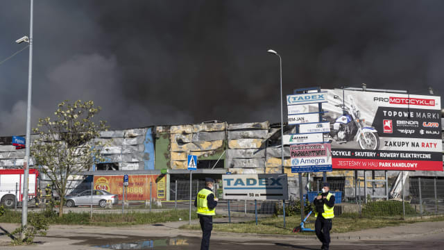 Black smoke seen in the sky above the burning Marywilska 44 shopping center in Warsaw.