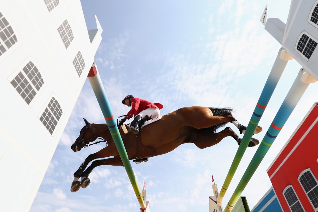 Eric Lamaze rides Fine Lady 5 during Team Jumping on Day 11 of the Rio 2016 Olympic Games