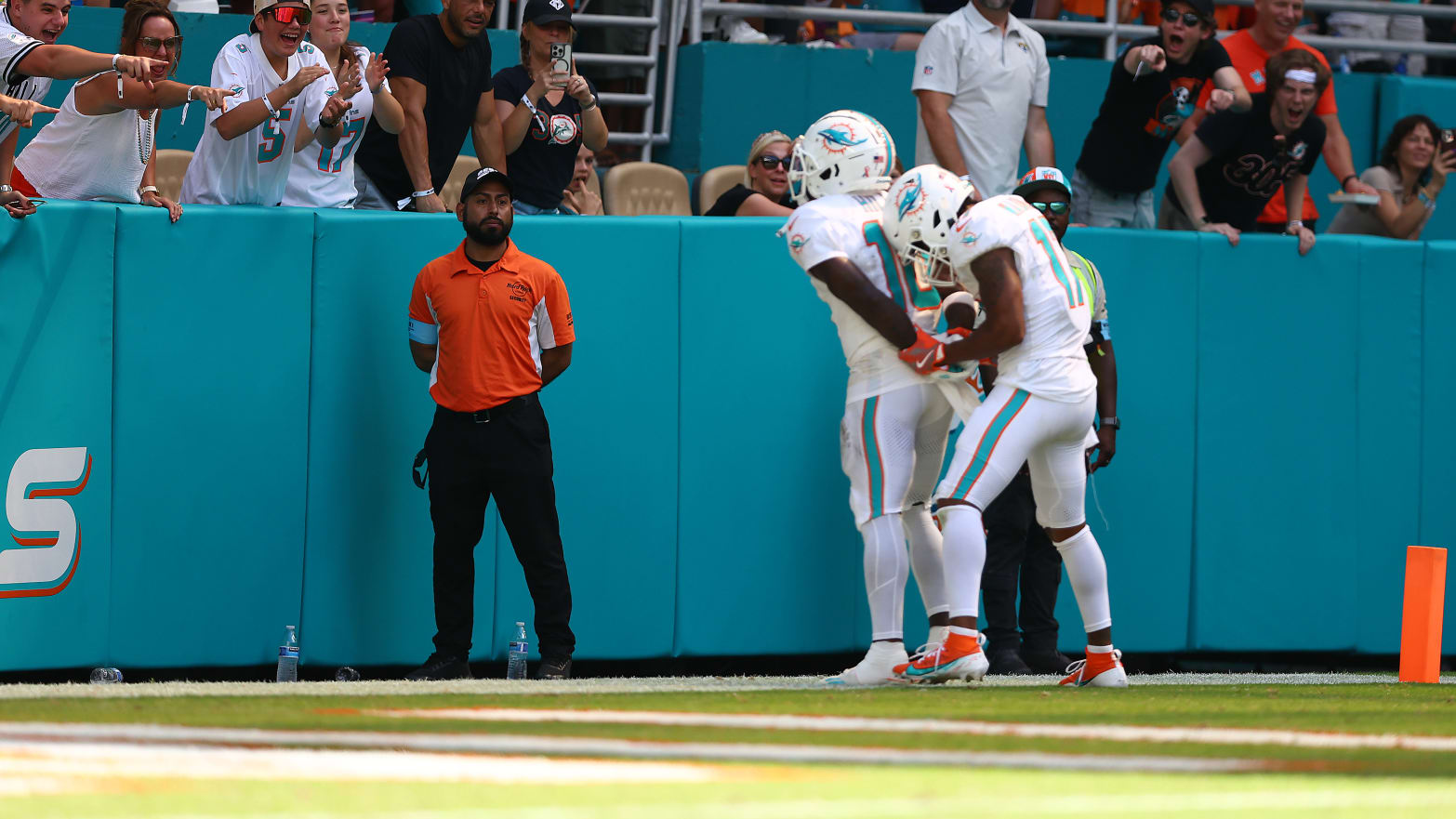 Tyreek Hill and Jaylen Waddle celebrating a touchdown during a September 2024 game. 