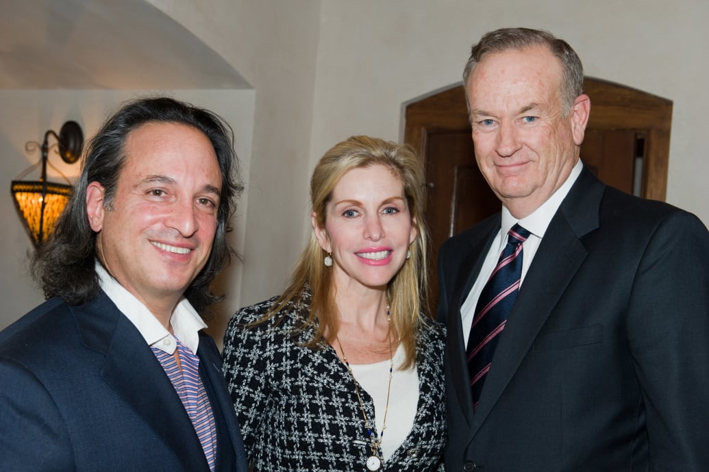 A photo of Jan Burman and his wife Renee with right-wing TV host Bill O'Reilly at a 2010 law enforcement fundraiser on Long Island.