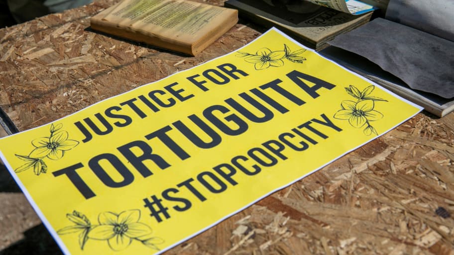 A sign that reads “Justice for Tortuguita #StopCopCity.”