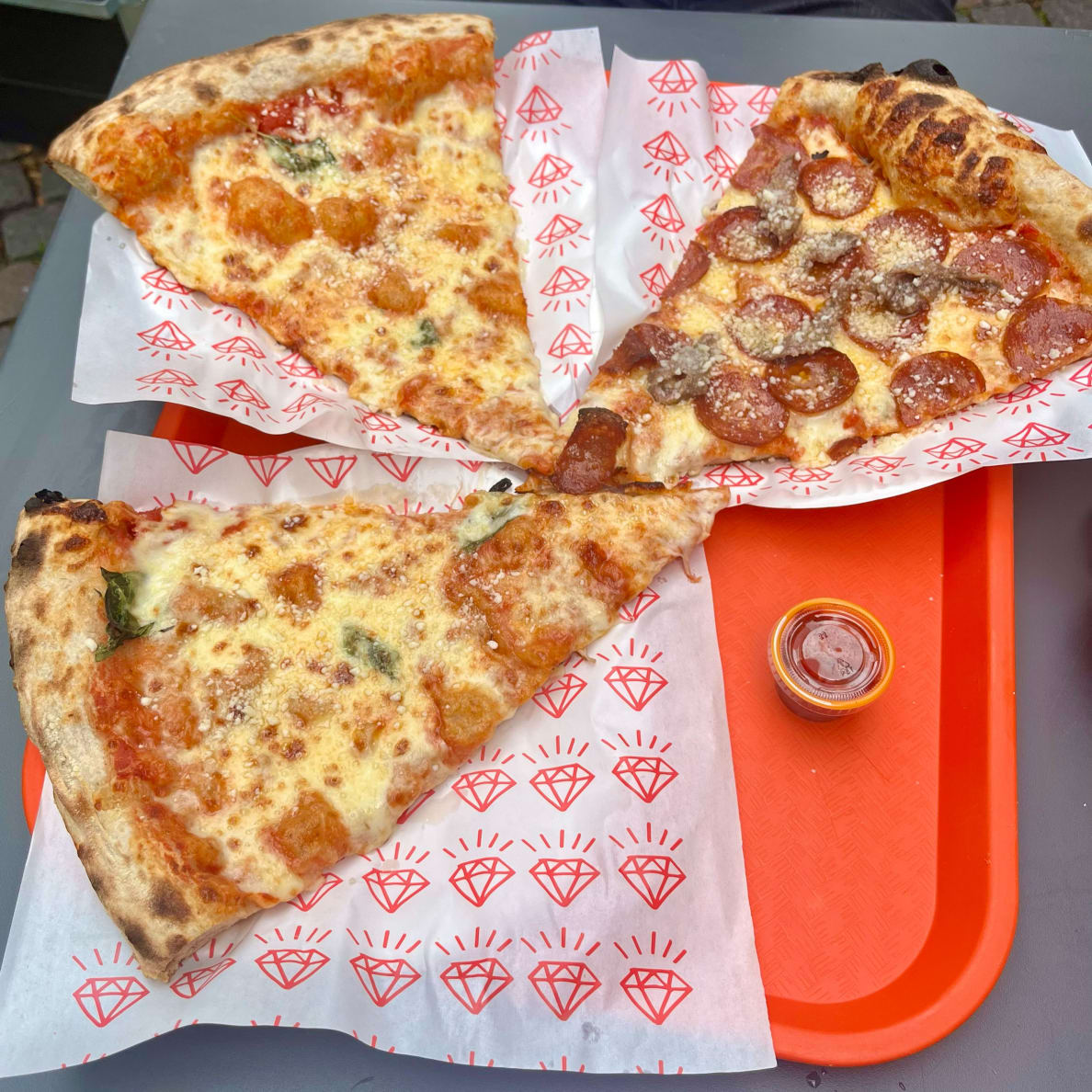 Three pizza slices at Diamond Slice in Copenhagen.