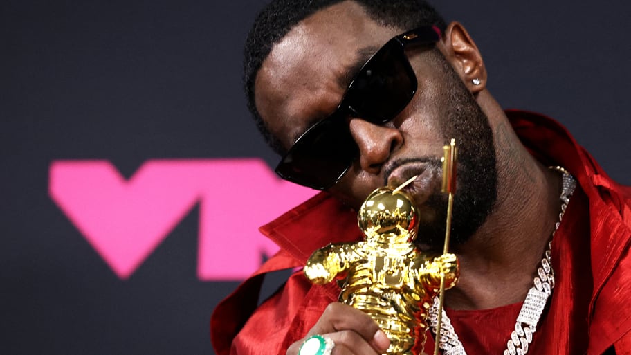 Diddy poses with the Global Icon Award at the 2023 MTV Video Music Awards at the Prudential Center in Newark, New Jersey, U.S., September 12, 2023. 