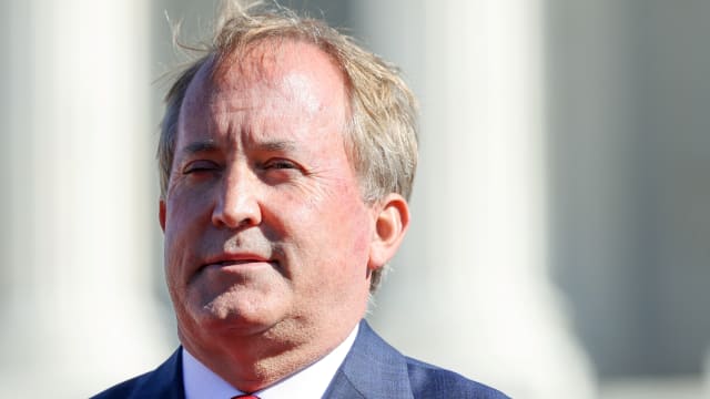 Texas Attorney General Ken Paxton leaves the U.S. Supreme Court following arguments over a challenge to a Texas law that bans abortion after six weeks in Washington, U.S., November 1, 2021.