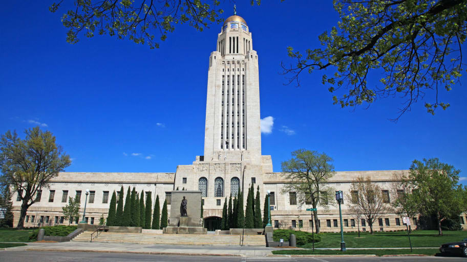 The Nebraska State Capitol building on a sunny day